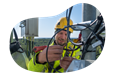 A cell tower technician performs routine maintenance.
