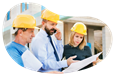 A group of framing contractors look over the blueprints to a building.
