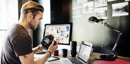 Photographer working in office.