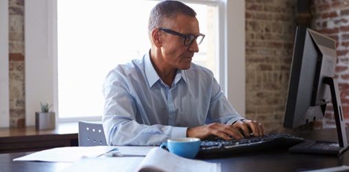 Man using computer.