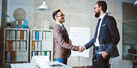 Two businessmen shaking hands