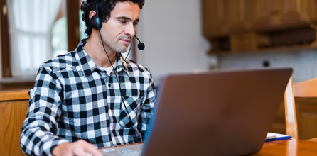 Remote employee on video conference call.