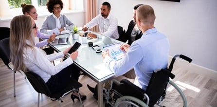 Handicapped individual conducting a meeting