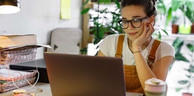 Freelancer working from home on her laptop