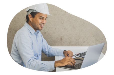 A landscaping professional calculating their business insurance costs A landscaping professional calculating their business insurance costs