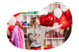 The owner of a party supply store arranging red and white balloons.