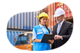 A business owner speaks with an employee at a container yard.