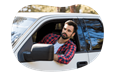 A hotshot driver looking out the window of a pickup truck.