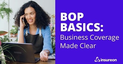 A small business owner on the phone with their laptop opened in front of them, next to the video title: "BOP Basics - Business Coverage Made Clear"